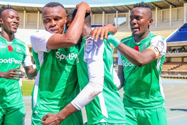 Gor Mahia FC players (L to R) Shafiq Batambuze, Jacques Tuyisenge and Harun Shakava celebrate the opening goal with scorer Kenneth Muguna (partly hidden) during their SportPesa Premier League Mashemeji Derby against AFC Leopards SC at the Moi International Sports Centre, Kasarani on Saturday, February 9, 2019. PHOTO/SPN