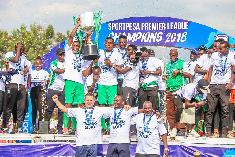 Gor Mahia FC players and officials celebrates with the trophy after they were declared 2018 SportPesa Premier League champions at Moi Stadium in Kisumu on Sunday,September 30,2018.PHOTO/Brian Kinyanjui