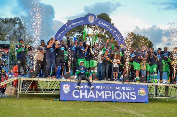 Gor Mahia FC players lift the 2018/19 SportPesa Premier League trophy at the Kenyatta Stadium, Machakos to mark their record-extending 18th crown on Saturday, May 25, 2019. PHOTO/SPN