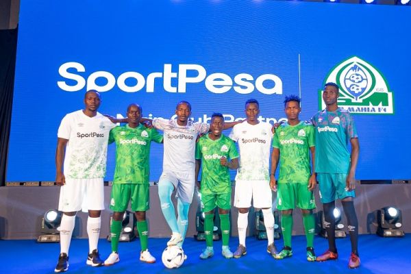 Gor Mahia players pose with their new kits for the 2022/23 season as SportPesa held a spectacular launch in Nairobi on Thursday, November 17, 2022. PHOTO | Simon Anyiko | SPN