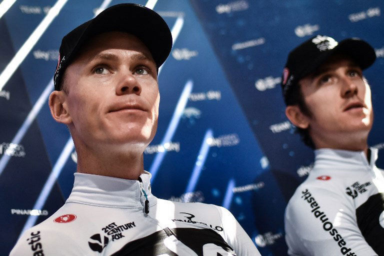 Great Britain's Team Sky cycling team riders, Great Britain's Christopher Froome (L) and the race's overall leader, Great Britain's Geraint Thomas (2ndL) address the media during a press conference on July 23, 2018 in Carcassonne, southwestern France, on the second rest day of the 105th edition of the Tour de France cycling race. PHOTO/AFP