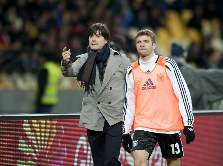 HAPPIER TIMES: Germany coach Joachim Joachim "Jogi" Loew gestures to striker Thomas Mueller during their international friendly against Ukraine in Kiev on November 11, 2011. PHOTO/AFP