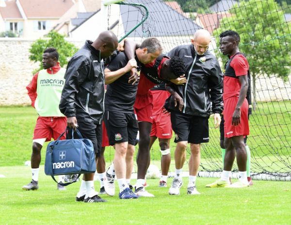 Harambee Stars defender, Brian Mandela (3rd left) is assisted out of the training pitch after injuring his knee on Monday, June 10, 2018. PHOTO/Courtesy/FKF