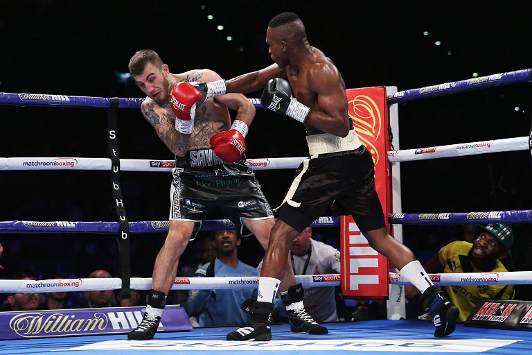 Hassan Mwakinyo (R) of Tanzania battles with Sam Eggington of England during their Super-Welterweight bout held at Arena Birmingham on September 8, 2018 in Birmingham, England. PHOTO/Getty Images