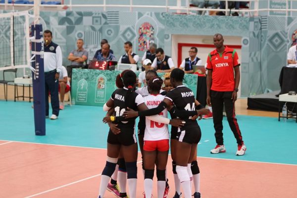 Head coach Paul Bitok (in red) watches as Malkia Strikers celebrate their victory agaisnt Nigeria in Morocco on August 28, 2019. PHOTO/ NOCK