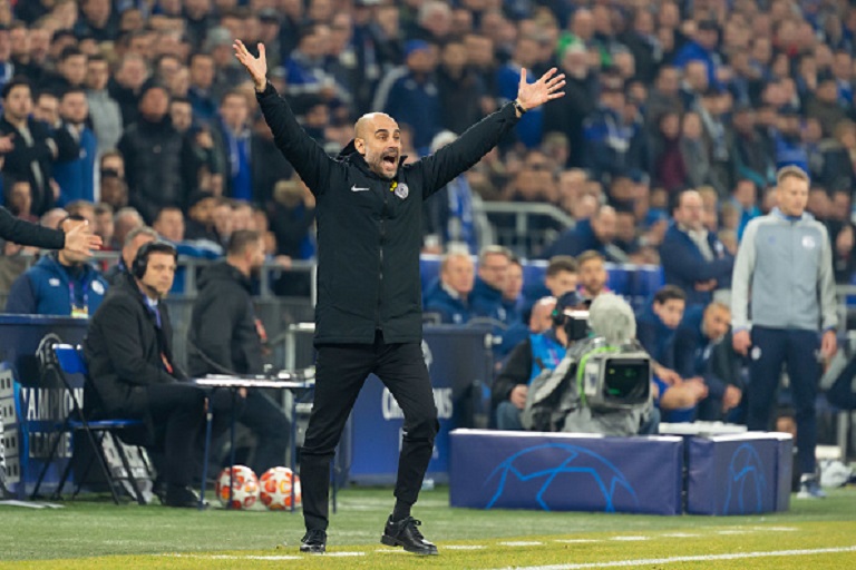 Head coach Pep Guardiola of Manchester City gestures during the UEFA Champions League Round of 16 First Leg match between FC Schalke 04 and Manchester City at Veltins-Arena on February 20, 2019 in Gelsenkirchen, Germany.PHOTO/GETTY IMAGES