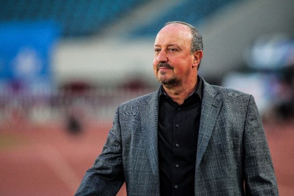 Head coach Rafael Benitez of Dalian Yifang reacts as he watches his players competing against Henan Jianye in their 16th round match during the 2019 Chinese Football Association Super League (CSL) in Dalian city, northeast China's Liaoning province, 7 July 2019. PHOTO | AFP