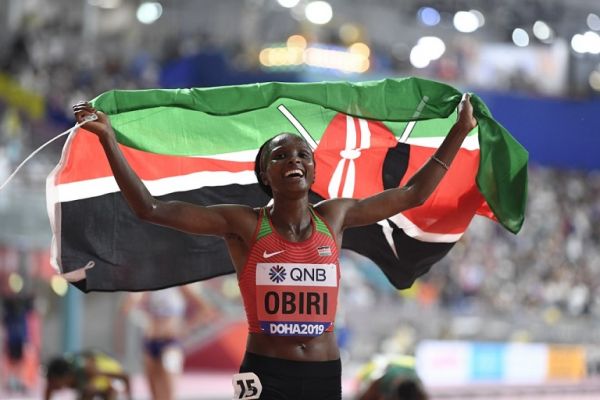 Hellen Obiri (KEN) competes and celebrates her victory on Women's 5000 m final during the IAAF World Athletics Championships at Khalifa Stadium in Doha, Qatar, on October 4, 2019. PHOTO | AFP