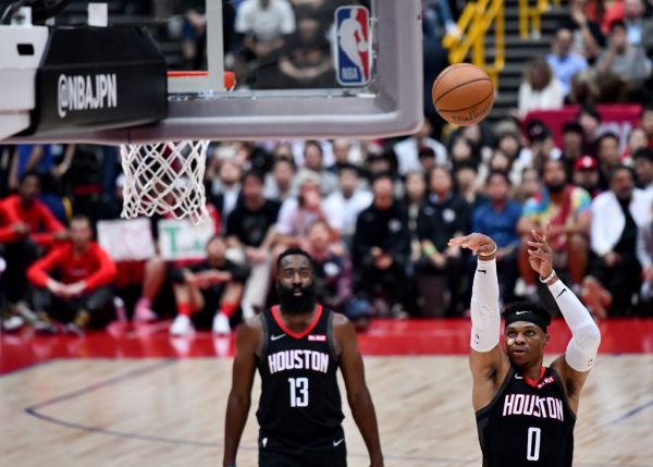 Houston Rockets guard Russell Westbrook (R) shoots a free throw as teammate James Harden looks on during the National Basketball Association (NBA) Japan Games 2019 pre-season basketball match between the Houston Rockets and Toronto Raptors in Saitama, a northern suburb of Tokyo on October 10, 2019. PHOTO | AFP