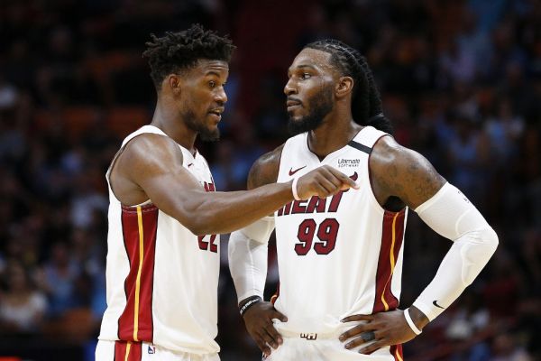 immy Butler #22 of the Miami Heat talks with Jae Crowder #99 against the Minnesota Timberwolves during the second half at American Airlines Arena on February 26, 2020 in Miami, Florida. PHOTO | AFP