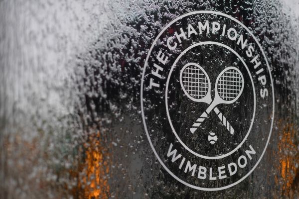 In this file photo a water feature with the Wimbledon logo stands by the members area at the All England Tennis Club in Wimbledon, southwest London, on July 1, 2018, on the eve of the 2018 Wimbledon Championships tennis tournament. Roger Federer and Serena Williams were among the tennis stars left devastated on Wednesday as Wimbledon was cancelled for the first time since World War II due to the coronavirus. The cancellation of the oldest Grand Slam tournament at London's All England Club leaves the season in disarray, with no tennis set to be played until mid-July. PHOTO | AFP