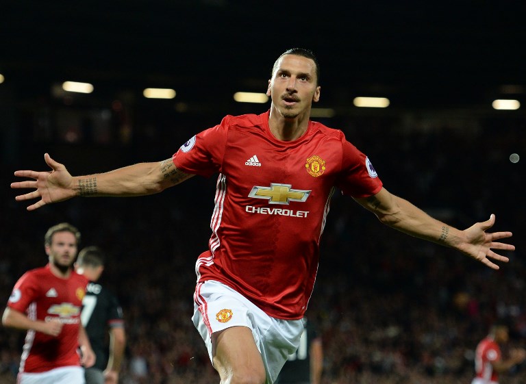 In this file photo taken on August 19, 2016 Manchester United's Swedish striker Zlatan Ibrahimovic celebrates after scoring their second goal from the penalty spot during the English Premier League football match between Manchester United and Southampton at Old Trafford in Manchester, north west England, on August 19, 2016.PHOTO/AFP