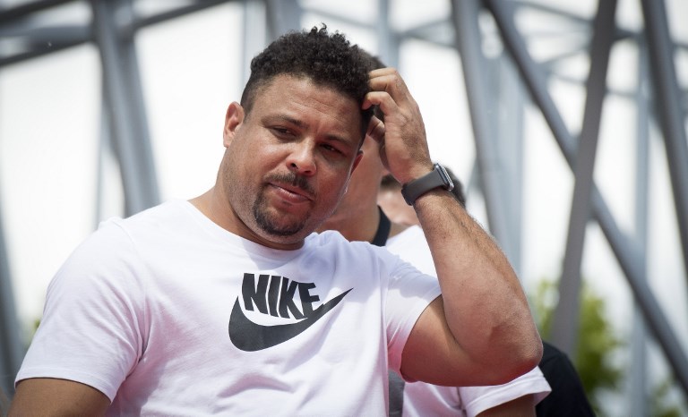 In this file photo taken on June 12, 2018 former Brazilian international player Ronaldo gestures during a promotional event in Moscow, ahead of the Russia 2018 World Cup football tournament. World Cup winner Ronaldo has reached a deal to buy 51 per cent of La Liga club Valladolid a regional daily reported on September 1, 2018, citing "sources close to the operation." PHOTO/AFP