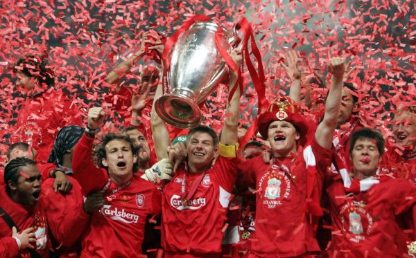 In this file photo taken on May 25, 2005, Liverpool's captain Steven Gerrard holds the throphy surrounded by teammates at the end of the UEFA Champions league football final AC Milan vs Liverpool, at the Ataturk Stadium in Istanbul. Liverpool won 3-2 on penalties. PHOTO | AFP