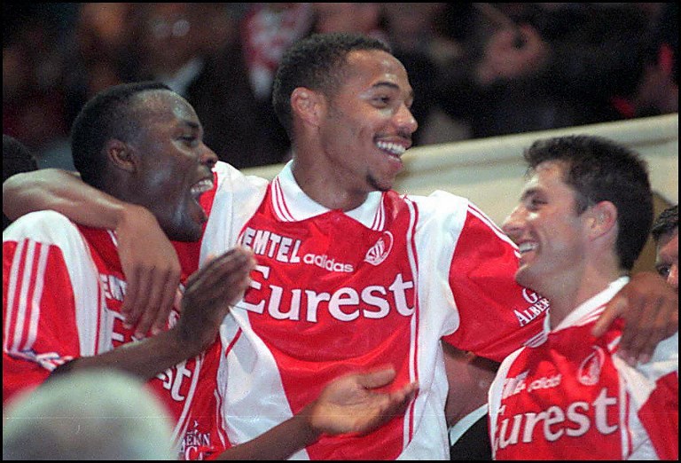 In this file photo taken on May 5, 1997 Monaco's players Victor Ikpeba, Thierry Henry and John Collins celebrate after winning the French Ligue 1 championship football match against Caen. Former Arsenal star Thierry Henry was on October 13 named as Monaco coach, the struggling Ligue 1 club announced. The 41-year-old French World Cup winner, who had been working as an assistant coach for the Belgian national team, signed a contract through until June 2021. PHOTO/AFP