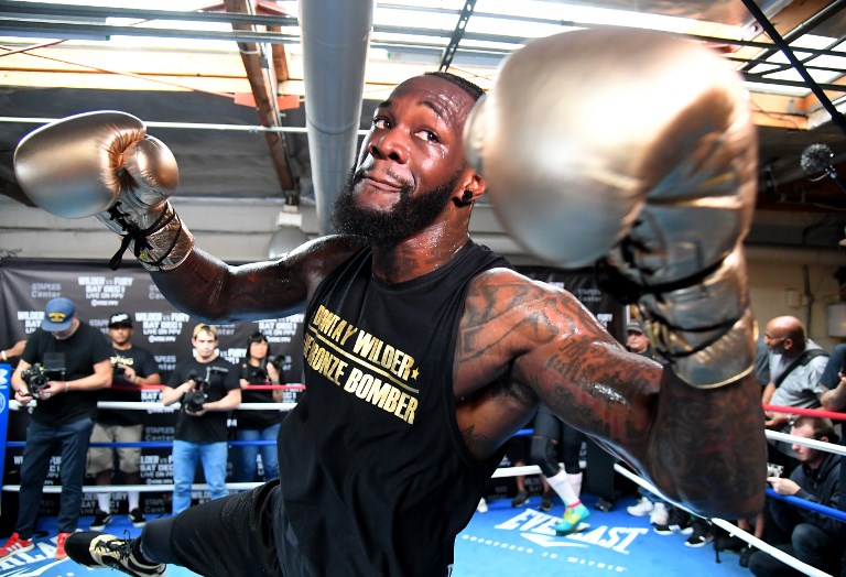 In this file photo taken on November 05, 2018, WBC Heavyweight Champion Deontay Wilder works out for the media at Churchill Boxing Club in Santa Monica, California. World champion Deontay Wilder said Thursday, November 15, 2018, the winner of his showdown with Tyson Fury can lay claim to being the best heavyweight in boxing. WBC champion Wilder faces off against Britain's Fury at the Staples Center in Los Angeles on December 1 in a battle of undefeated fighters. The winner of the fight could advance to a showdown with Anthony Joshua, the IBF, WBA and WBO heavyweight champion who is also unbeaten. While many observers believe Joshua is the best heavyweight in the division, Wilder is adamant that the 2012 Olympic champion does not even deserve to be ranked in the top three. PHOTO/AFP