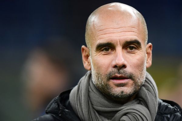 In this file photo taken on November 06, 2019 Manchester City's Spanish manager Pep Guardiola attends the UEFA Champions League Group C football match Atalanta Bergamo vs Manchester City at the San Siro stadium in Milan. Pep Guardiola's agent has ruled out him returning to Bayern Munich, who are currently looking for a new head coach, at least until the Spaniard's contract expires at Manchester City in 2021, according to reports. PHOTO | AFP