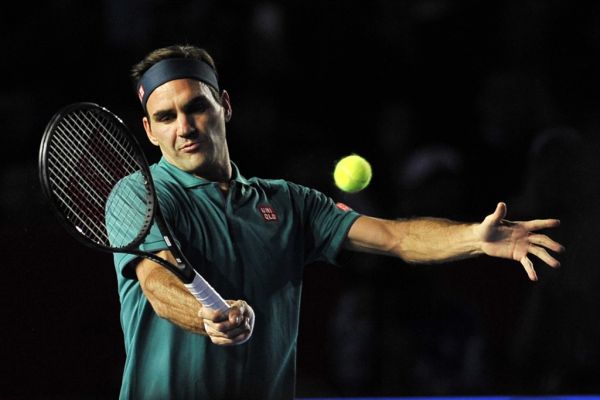 In this file photo taken on November 24, 2019 Switzerland's Roger Federer returns the ball to Germany's Alexander Zverev during their tennis exhibition singles match, in Mexico City. Novak Djokovic, Roger Federer and Rafael Nadal have kept a tight grip on the Majors over the past decade, with the Serb and the Swiss particularly prolific at the year's opening Grand Slam. PHOTO | AFP