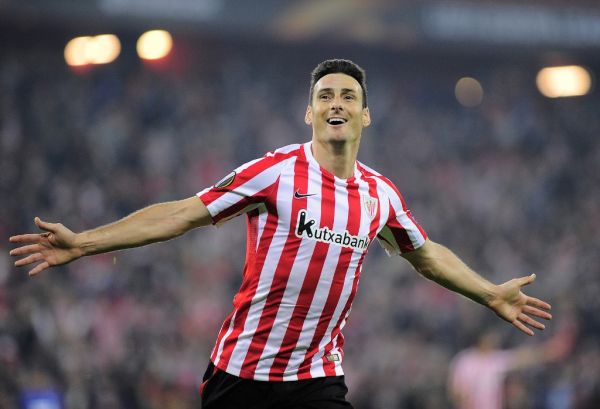 In this file photo taken on November 3, 2016 Athletic Bilbao's forward Aritz Aduriz celebrates after scoring his team's fourth goal during the Europa League Group F football match Athletic Club de Bilbao vs KRC Genk at the San Mames stadium in Bilbao. The veteran international striker of Athletic Bilbao, Aritz Aduriz, announced on May 20, 2020 that he hangs up his boots after undergoing a hip surgery. PHOTO | AFP