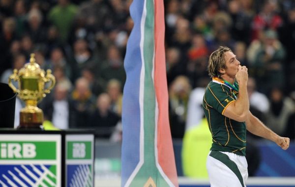 In this file photo taken on October 20, 2007 South Africa's fullback Percy Montgomery kisses his medal in front of the William Webb Ellis cup after winning the rugby union World Cup final match against England at the Stade de France in Saint-Denis, north of Paris. This tournament of surprises began with Argentina beating hosts France in the opening match and ended with South Africa claiming their second title. In between Fiji beat the Welsh who consequently missed out on the quarter-finals as did Ireland who, like the French, were undone by a bold and exciting Pumas team. PHOTO | AFP