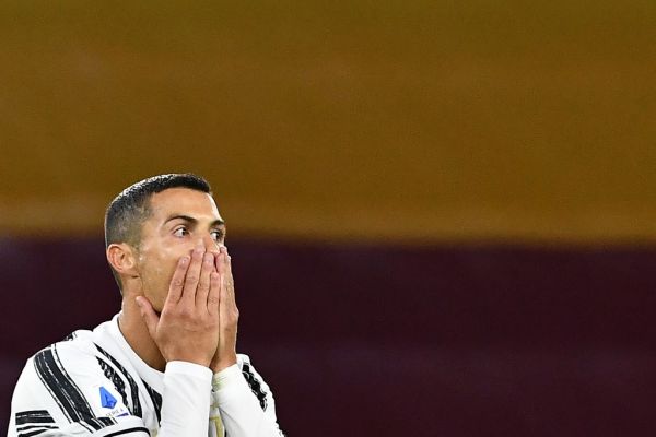 In this file photo taken on September 27, 2020 Juventus' Portuguese forward Cristiano Ronaldo reacts after missing a goal opportunity during the Italian Serie A football match Roma vs Juventus on September 27, 2020 at the Olympic stadium in Rome. Cristiano Ronaldo has tested positive for Covid-19, the Portuguese Football Federation announced on October 13, 2020. PHOTO | AFP