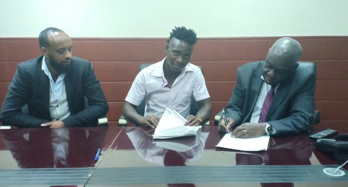 In this image supplied by Gor Mahia FC, Hashim Sempala (centre) signs a two-year deal to join the club from Tusker FC on Monday, April 8, 2019. PHOTO/Courtesy