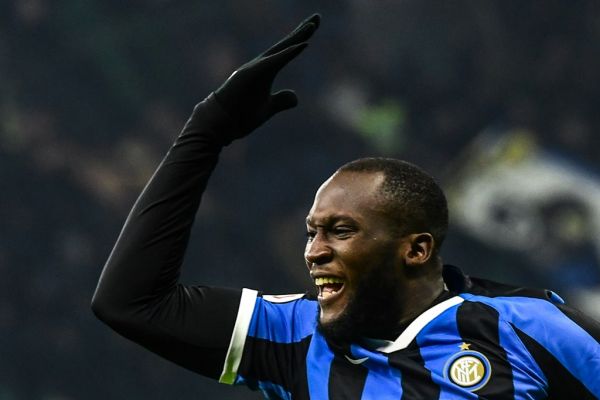 Inter Milan's Belgian forward Romelu Lukaku celebrates after opening the scoring during the Italian Cup (Coppa Italia) round of 16 football match Inter Milan vs Cagliari on January 14, 2020 at the San Siro stadium in Milan. PHOTO | AFP