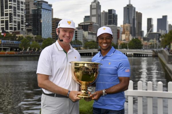 International team captain Ernie Els of South Africa (L) and Tiger Woods, captain of the US team (R) hold the Presidents Cup trophy in Melbourne on December 9, 2019. The Presidents Cup is to be played at the Royal Melbourne Colf Club from December 12-15. PHOTO | AFP