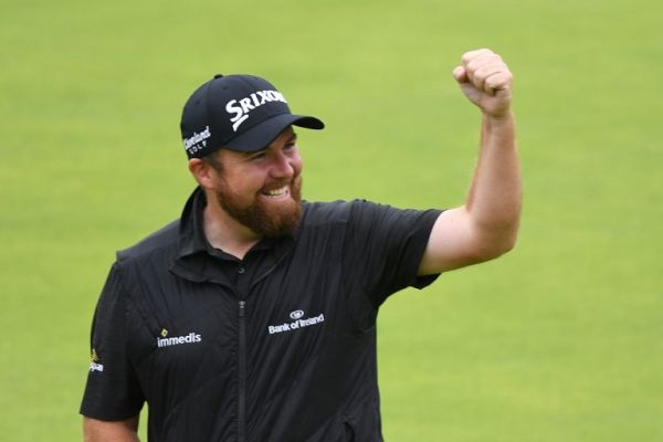 Ireland's Shane Lowry celebrates as he walks up the 18th fairway during the final round of the British Open golf Championships at Royal Portrush golf club in Northern Ireland on July 21, 2019. PHOTO | AFP