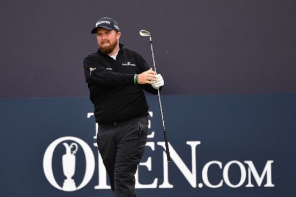 Ireland's Shane Lowry tees off from the first hole during the first round of the British Open golf Championships at Royal Portrush golf club in Northern Ireland on July 18, 2019.PHOTO/ AFP