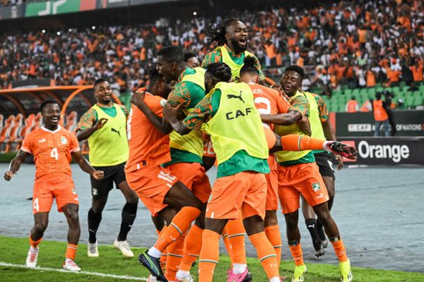Ivory Coast players celebrate after reaching the AFCON 2023 finals. PHOTO| AFP