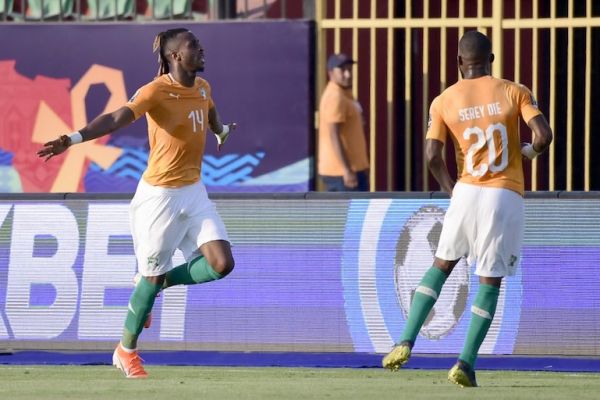 Ivory Coast's forward Jonathan Kodjia (L) celebrates after scoring a goal during the 2019 Africa Cup of Nations (CAN) football match between Ivory Coast and South Africa at the Al Salam Stadium in Cairo on June 24, 2019. PHOTO/AFP