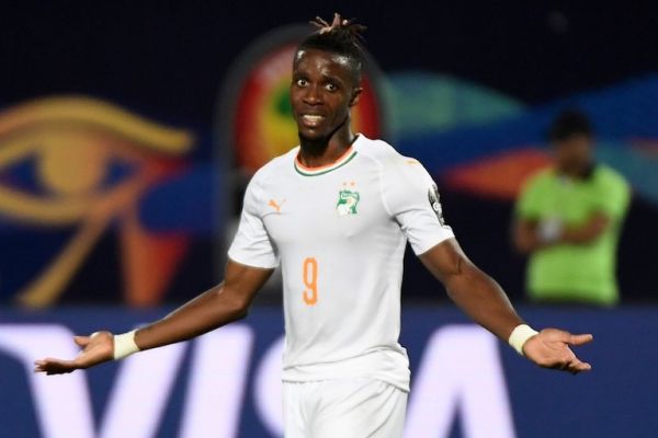 Ivory Coast's forward Wilfried Zaha reacts during the 2019 Africa Cup of Nations (CAN) Group D football match between Namibia and Ivory Coast at the 30 June Stadium in the Egyptian capital Cairo on July 1, 2019. PHOTO/AFP