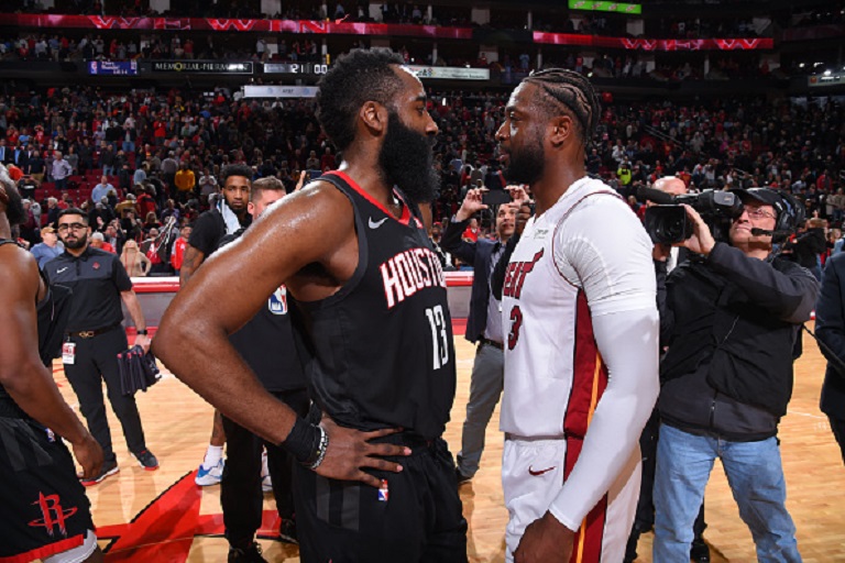 James Harden #13 of the Houston Rockets and Dwyane Wade #3 of the Miami Heat talk after a game on February 28, 2019 at the Toyota Center in Houston, Texas. PHOTO/GETTY IMAGES