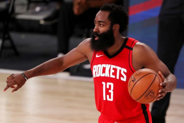 James Harden #13 of the Houston Rockets dribbles during the second half against the Dallas Mavericks at The Arena at ESPN Wide World Of Sports Complex on July 31, 2020 in Lake Buena Vista, Florida. PHOTO | AFP