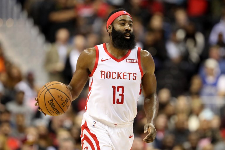 James Harden #13 of the Houston Rockets dribbles the ball against the Washington Wizards in the first half at Capital One Arena on November 26, 2018 in Washington, DC.PHOTO/AFP