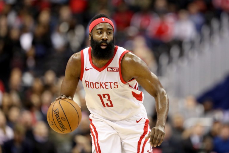 James Harden of the Houston Rockets dribbles the ball against the Washington Wizards in the first half at Capital One Arena on November 26, 2018 in Washington, DC. PHOTO/AFP