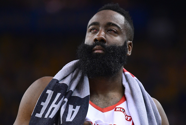 James Harden of the Houston Rockets walks back onto the court after he was poked in the left eye by Draymond Green of the Golden State Warriors in Game Two of the Second Round of the 2019 NBA Western Conference Playoffs at ORACLE Arena on April 30, 2019 in Oakland, California. PHOTO/AFP