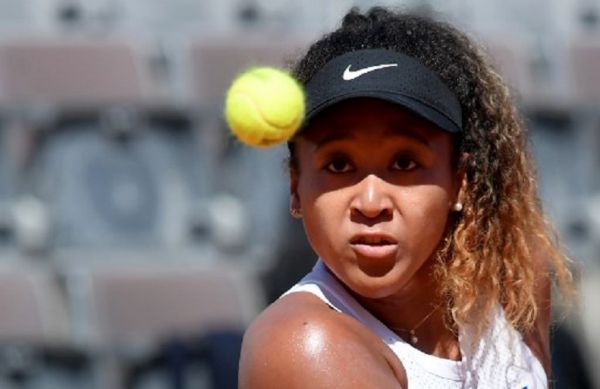 Japan's Naomi Osaka returns the ball to Slovak Dominika Cibulkova during their WTA Masters tournament tennis match in Rome at the Foro Italico, on May 16, 2019. PHOTO/ AFP