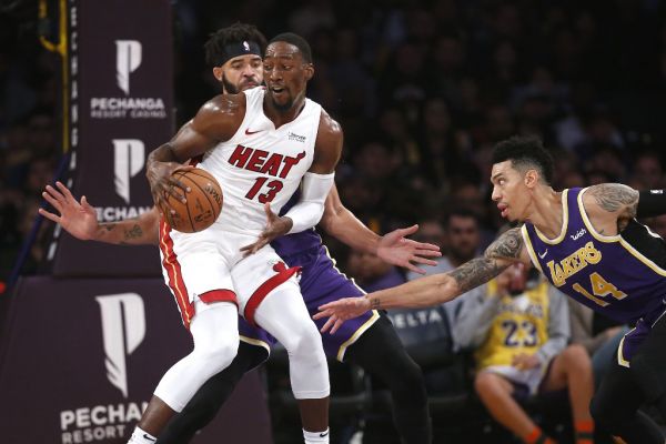 JaVale McGee #7 and Danny Green #14 of the Los Angeles Lakers defend against Bam Adebayo #13 of the Miami Heat during the second half of a game at Staples Center on November 08, 2019 in Los Angeles, California. PHOTO | AFP
