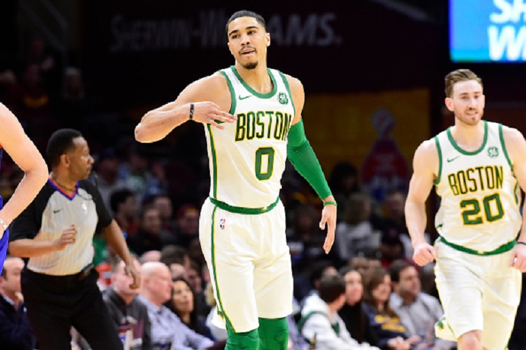 Jayson Tatum #0 of the Boston Celtics celebrates after scoping during the first half against the Cleveland Cavaliers at Quicken Loans Arena on March 26, 2019 in Cleveland, Ohio. PHOTO/GettyImages
