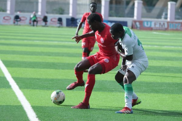 John Bocco akimiliki mpira mbele ya mchezoji wa Mtibwa Sugar