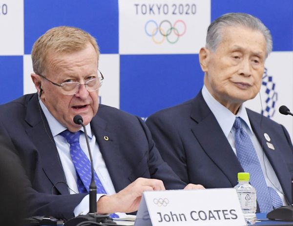 John Coates, chairman of the IOC Coordination Commission, and Yoshiro Mori, Tokyo Olympic Organising Commitee chairman, attend a press conference after officially announceing its decision to relocate the marathon and racing walk events site from Tokyo to Sapporo in Tokyo on Nov. 1, 2019. IOC aimed to avoid an extreme heat and humidity in Tokyo's August for athletes first policy. Yuriko Koike, Tokyo Metropolitan Governor will not agree with IOC decision, however, Tokyo government is considering accepting the proposed relocation of the 2020 Olympic marathon and racing walk. PHOTO | AFP