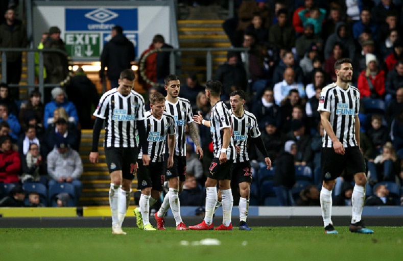 Joselu of Newcastle United celebrates with team mates after scoring his sides third goal during the FA Cup Third Round Replay match between Blackburn Rovers and Newcastle United at Ewood Park on January 15, 2019 in Blackburn, United Kingdom. PHOTO/GettyImages
