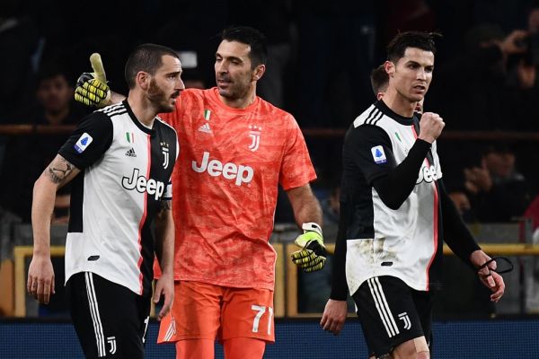Juventus' Italian defender Leonardo Bonucci, Juventus' Italian goalkeeper Gianluigi Buffon and Juventus' Portuguese forward Cristiano Ronaldo react at the end of the Italian Serie A football match Sampdoria vs Juventus on December 18, 2019 at the Luigi-Ferraris stadium in Genoa. Buffon played on December 18, 2019 his 647th Serie A game, equaling a record set by former Italian AC Milan defender Paolo Maldini. PHOTO | AFP