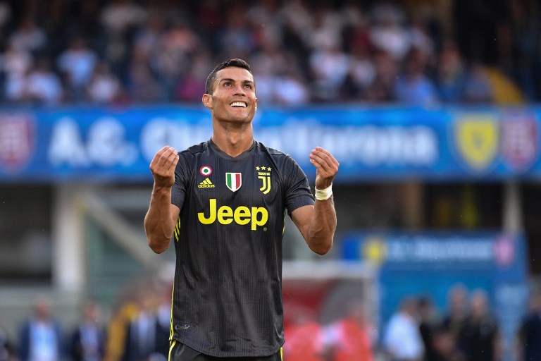 Juventus' Portuguese forward, Cristiano Ronaldo reacts after missing a shot during the Italian Serie A football match AC Chievo vs Juventus at the Marcantonio-Bentegodi stadium in Verona on August 18, 2018.PHOTO/AFP