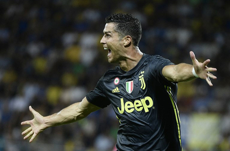 Juventus' Portuguese forward Cristiano Ronaldo celebrates after he scored during the Italian Serie A football match between Frosinone and Juventus Turin on September 23, 2018 at the Benito-Stirpe Stadium in Frosinone. PHOTO/AFP