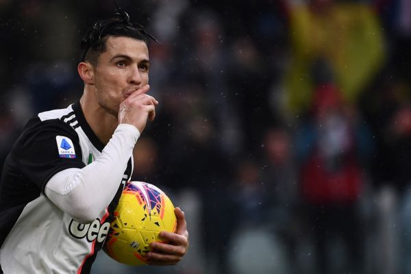 Juventus' Portuguese forward Cristiano Ronaldo celebrates after scoring a goal during the Italian Serie A football match Juventus vs Sassuolo on December 1, 2019, at the Juventus Allianz stadium in Turin. PHOTO | AFP