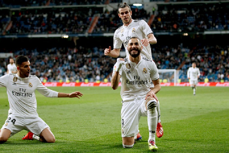 Karim Benzema of Real Madrid celebrates 3-2 with Gareth Bale of Real Madrid, Dani Ceballos of Real Madrid during the La Liga Santander match between Real Madrid v SD Huesca at the Santiago Bernabeu on March 31, 2019 in Madrid Spain. PHOTO/ GETTY IMAGES