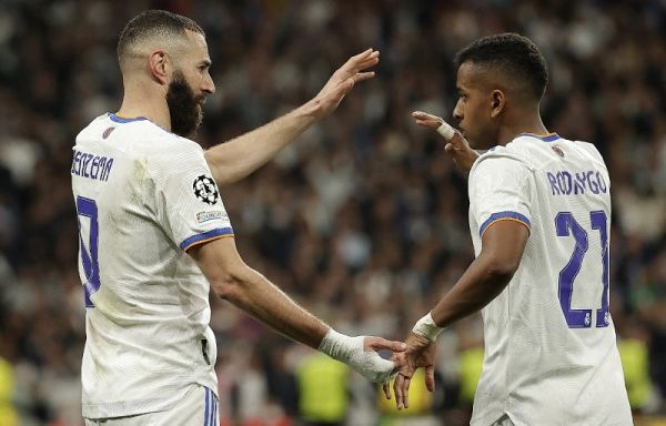 Karim Benzema of Real Madrid celebrates with his team mates after scoring a goal during the UEFA Champions League Semi Final second leg match between Manchester City and Real Madrid at Santiago Bernabeu Stadium on May 4, 2022 in Madrid, Spain. PHOTO | AFP